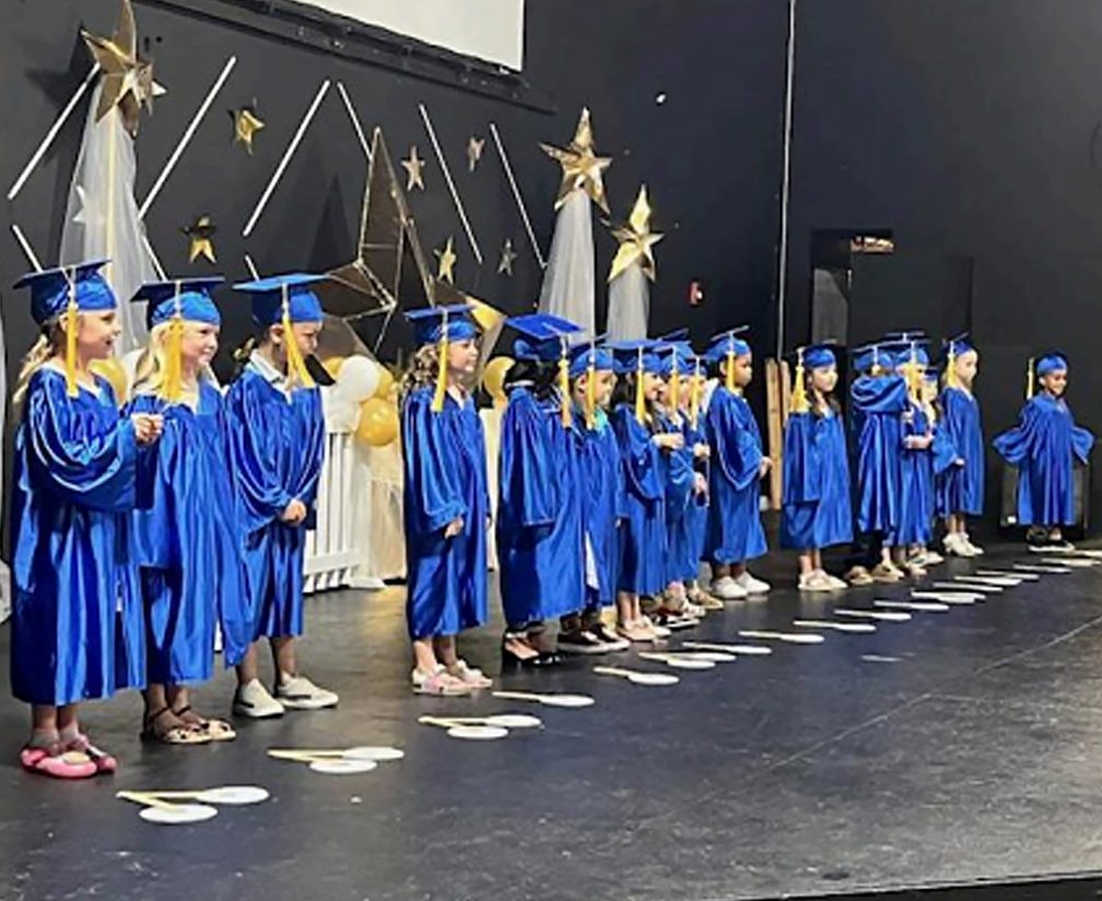 Creative-Kids-Lake-Wylie-graduates-on-stage